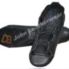 A pair of black Irish dance shoes made of soft leather, featuring lace-up design for a snug fit, used for traditional Irish dancing.