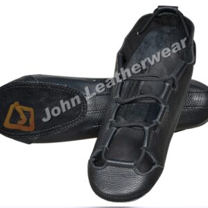 A pair of black Irish dance shoes made of soft leather, featuring lace-up design for a snug fit, used for traditional Irish dancing.